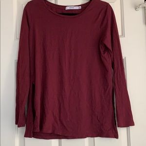 Tunic with slits are sides